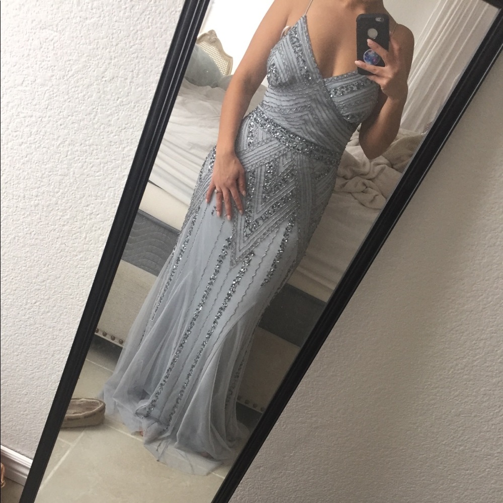 Floor length beaded gown.
